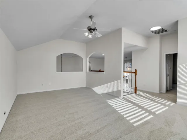 a view of a livingroom with a staircase