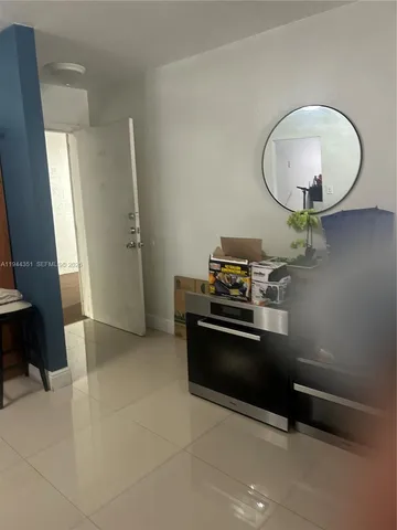 a view of a livingroom with a staircase