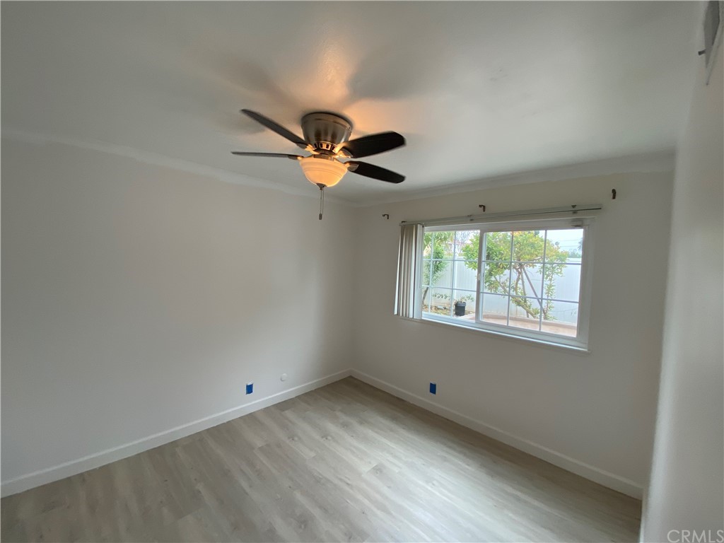 5321 Strasbourg Avenue Irvine, CA 92604 - Photo 12 of 28 an empty room with a window and a ceiling fan