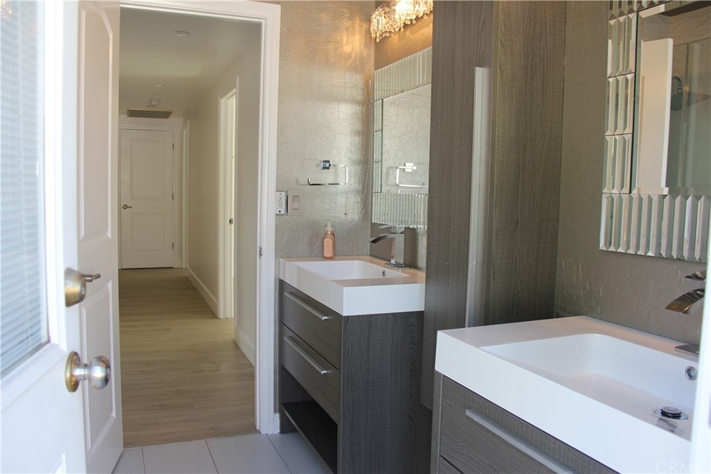 5321 Strasbourg Avenue Irvine, CA 92604 - Photo 16 of 28 a bathroom with a sink and a mirror