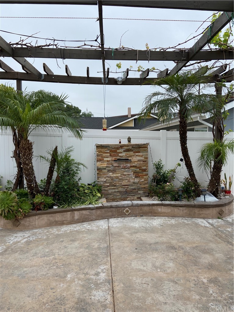 5321 Strasbourg Avenue Irvine, CA 92604 - Photo 20 of 28 a front view of a building with garage and parking