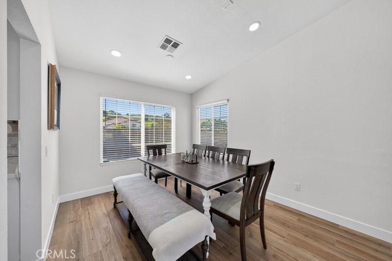 19610 Vega Way Rowland Heights, CA 91748 - Photo 13 of 30 a dining room with furniture and wooden floor