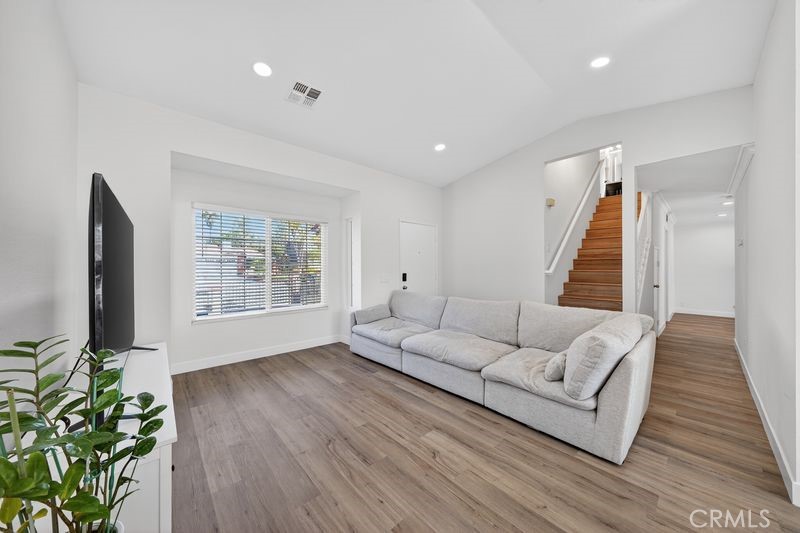 19610 Vega Way Rowland Heights, CA 91748 - Photo 3 of 30 a living room with furniture and a flat screen tv
