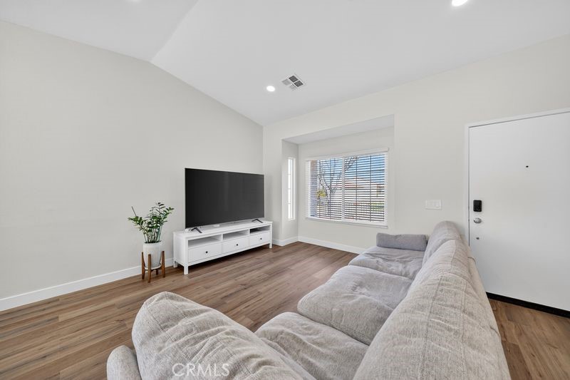 19610 Vega Way Rowland Heights, CA 91748 - Photo 7 of 30 a living room with furniture and a flat screen tv