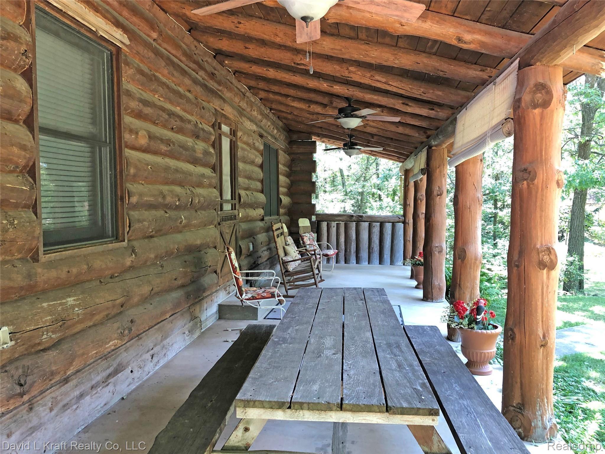 6732 Champagne Road Kinde, MI 48445 - Photo 3 of 24 6732ChampagnePorch.jpg