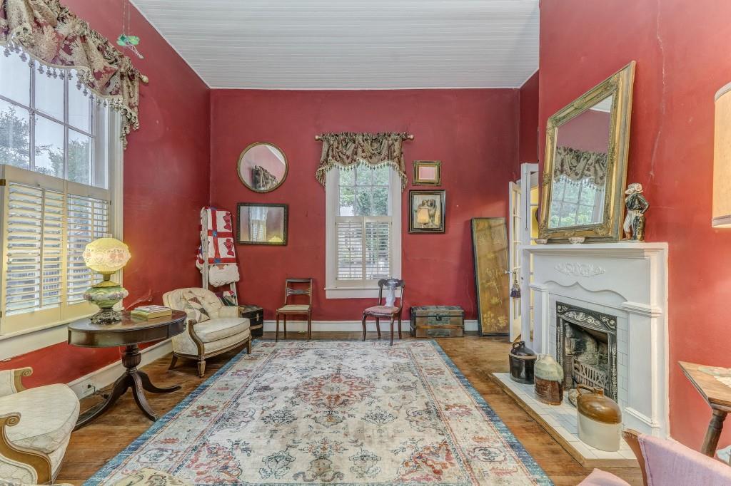 1006 Avenue A Rome, GA 30165 - Photo 14 of 61 a living room with furniture and a fireplace