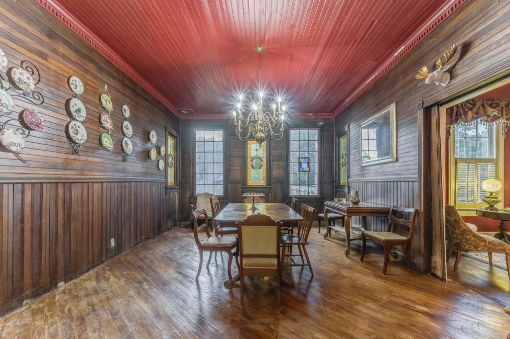 1006 Avenue A Rome, GA 30165 - Photo 17 of 61 a dining room with furniture and wooden floor