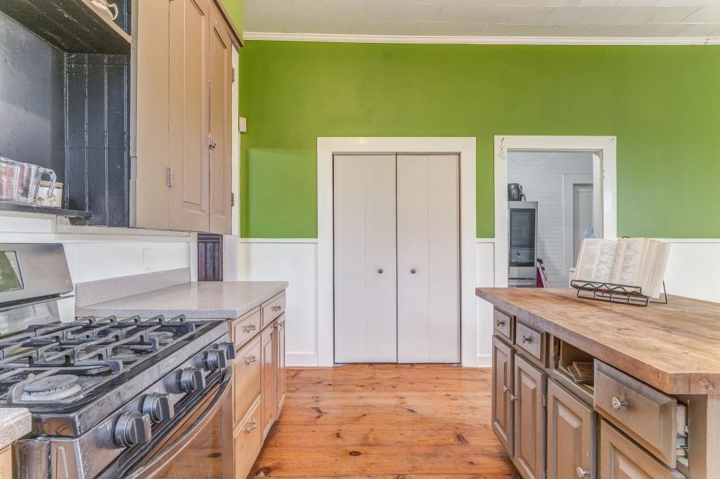 1006 Avenue A Rome, GA 30165 - Photo 33 of 61 a kitchen with a stove and a sink