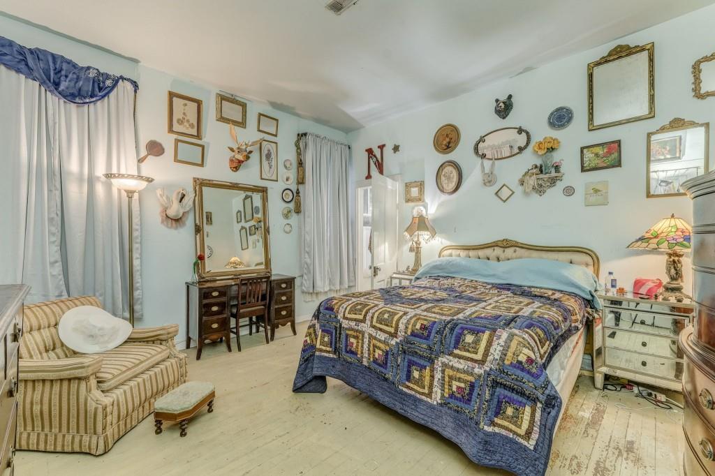 1006 Avenue A Rome, GA 30165 - Photo 39 of 61 a bedroom with a bed and dresser with rug