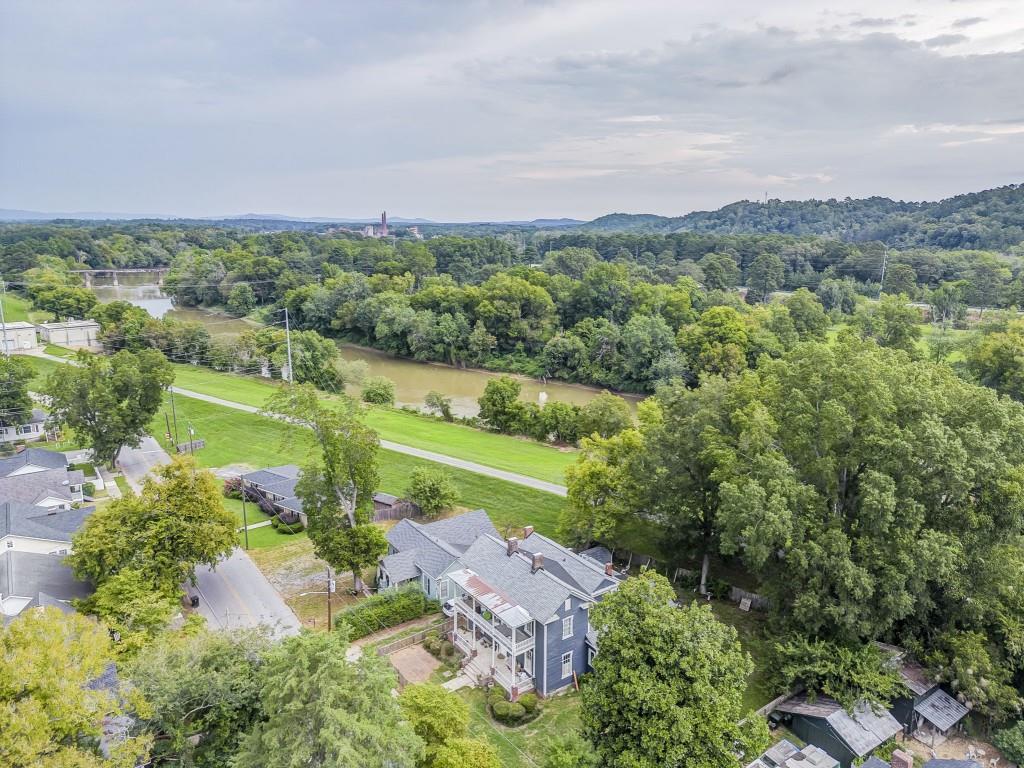1006 Avenue A Rome, GA 30165 - Photo 4 of 61 an aerial view of residential houses with outdoor space and trees