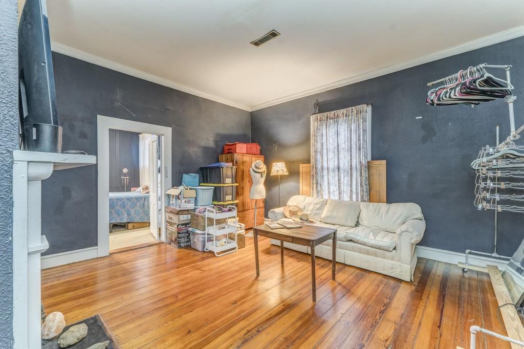 1006 Avenue A Rome, GA 30165 - Photo 47 of 61 a living room with furniture and a wooden floor