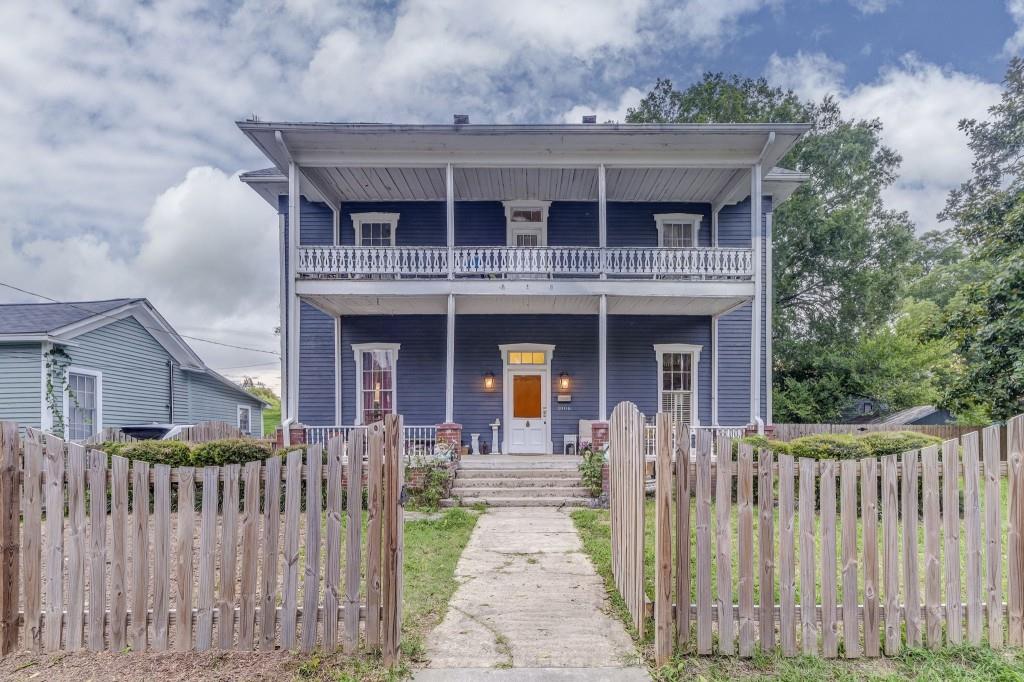 1006 Avenue A Rome, GA 30165 - Photo 57 of 61 a front view of a house with glass windows