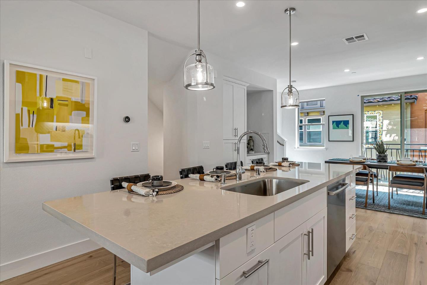 1277 Verano Road Mountain View, CA 94043 - Photo 14 of 52 a kitchen with sink a counter and chairs