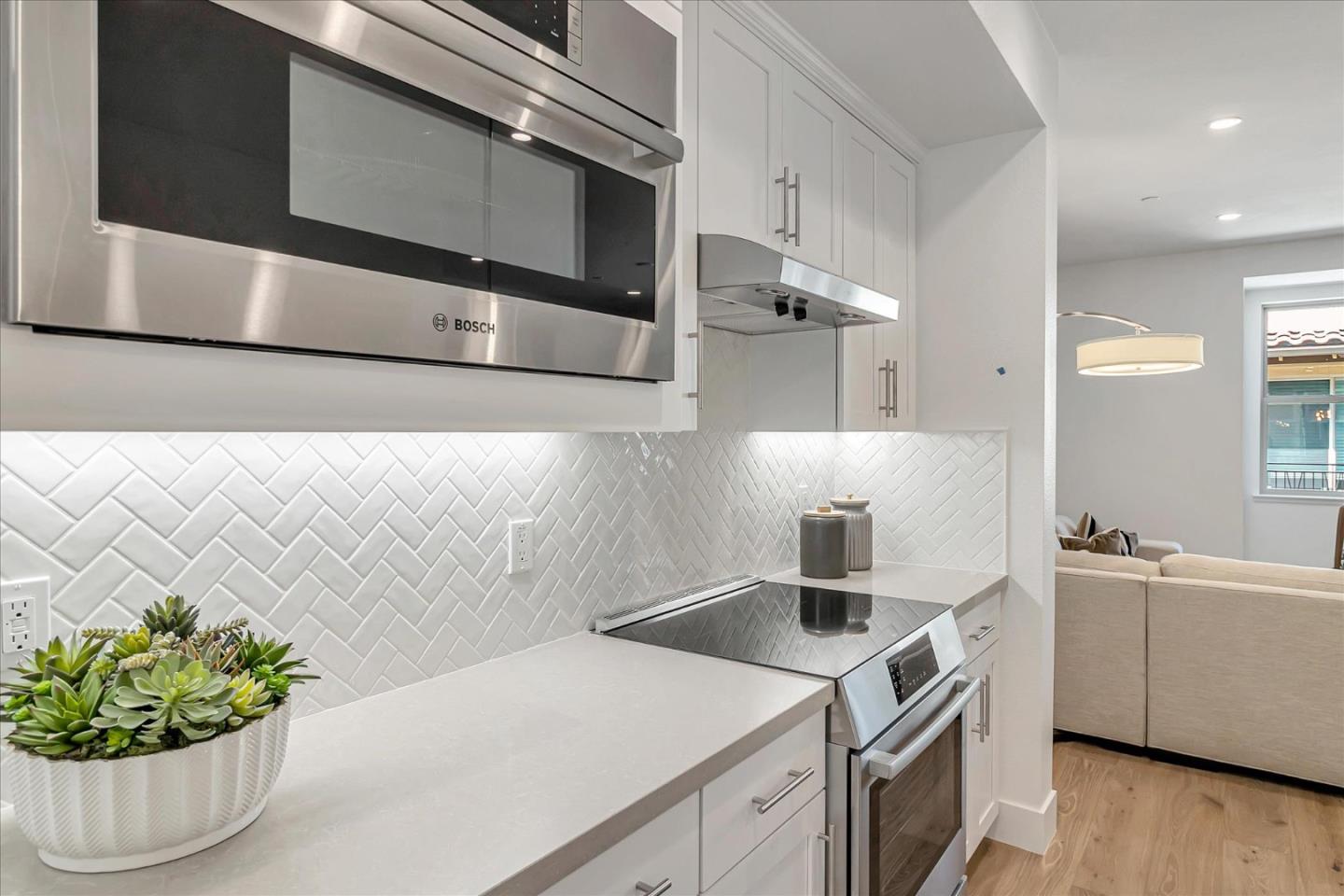 1277 Verano Road Mountain View, CA 94043 - Photo 16 of 52 a kitchen with a sink and a stove top oven