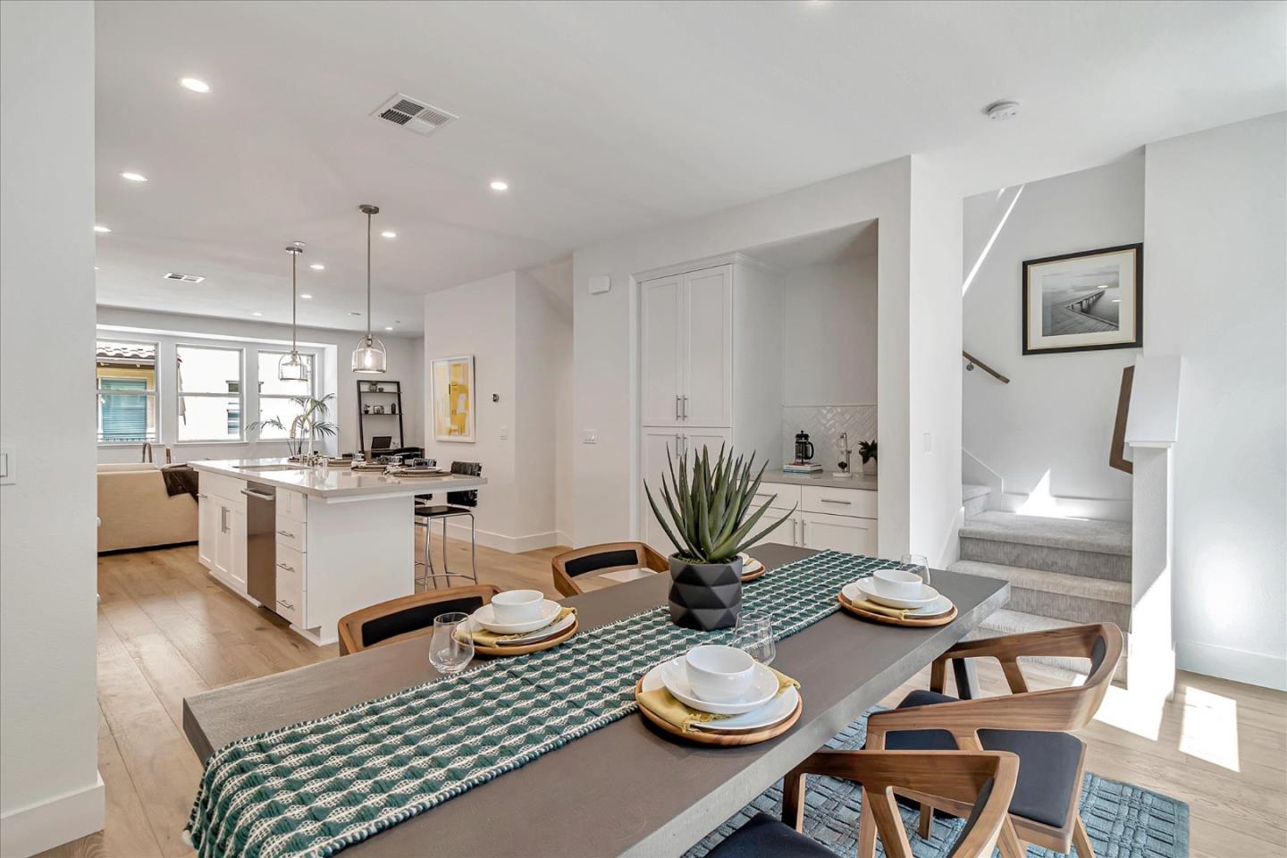 1277 Verano Road Mountain View, CA 94043 - Photo 21 of 52 a kitchen with a table and chairs in it