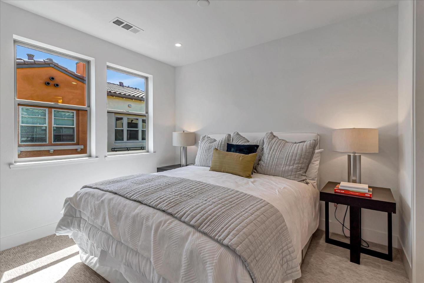 1277 Verano Road Mountain View, CA 94043 - Photo 26 of 52 a bedroom with a large bed and a window