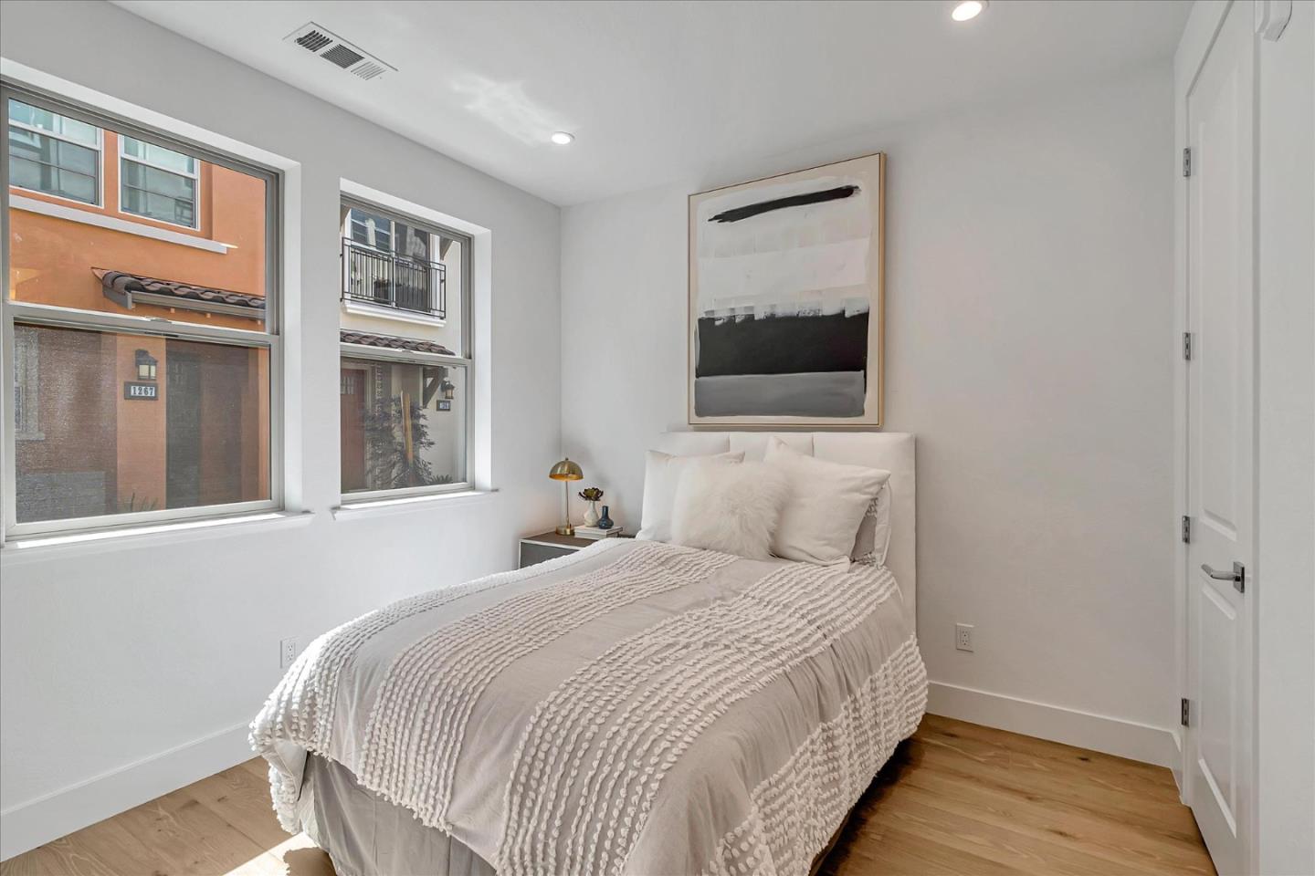 1277 Verano Road Mountain View, CA 94043 - Photo 29 of 52 a bedroom with a bed and a window