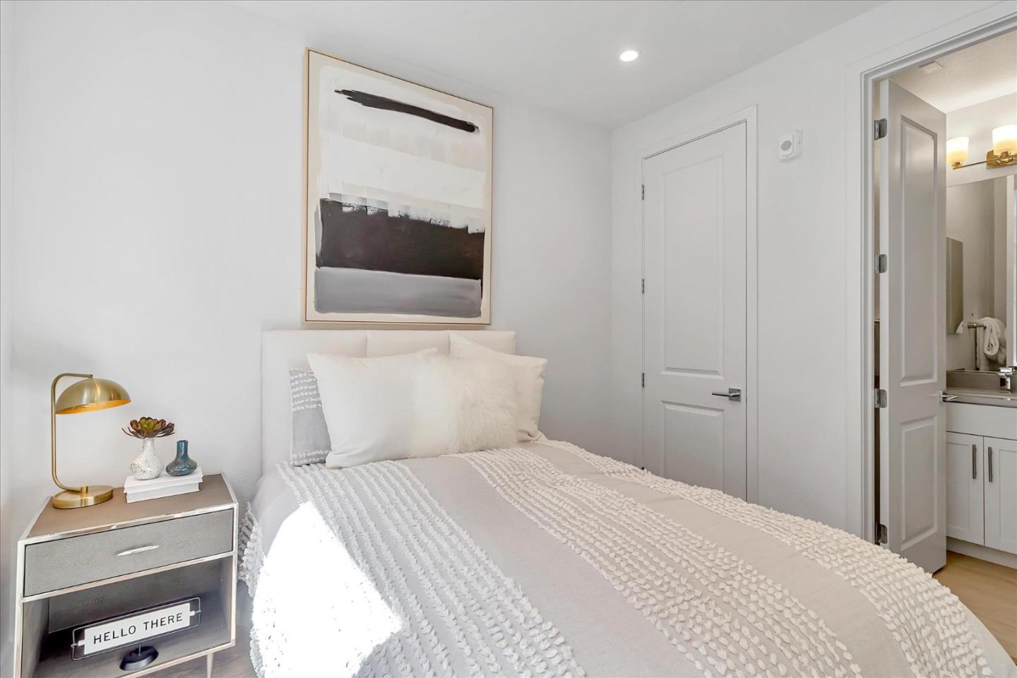 1277 Verano Road Mountain View, CA 94043 - Photo 30 of 52 a bedroom with a bed and a mirror