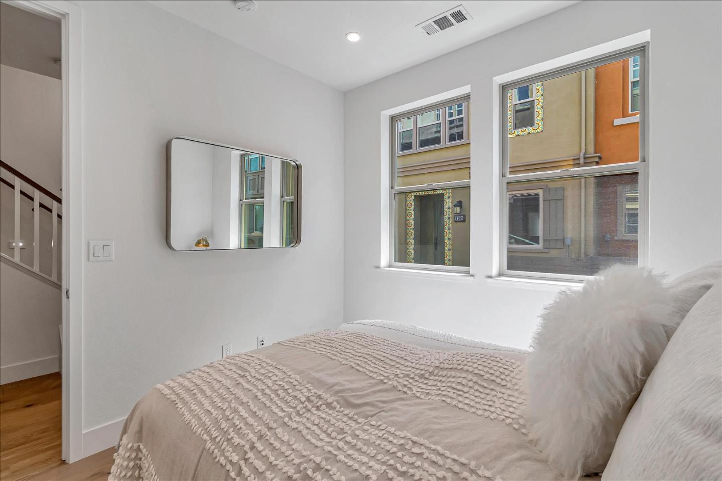 1277 Verano Road Mountain View, CA 94043 - Photo 31 of 52 a bedroom with a bed and a window