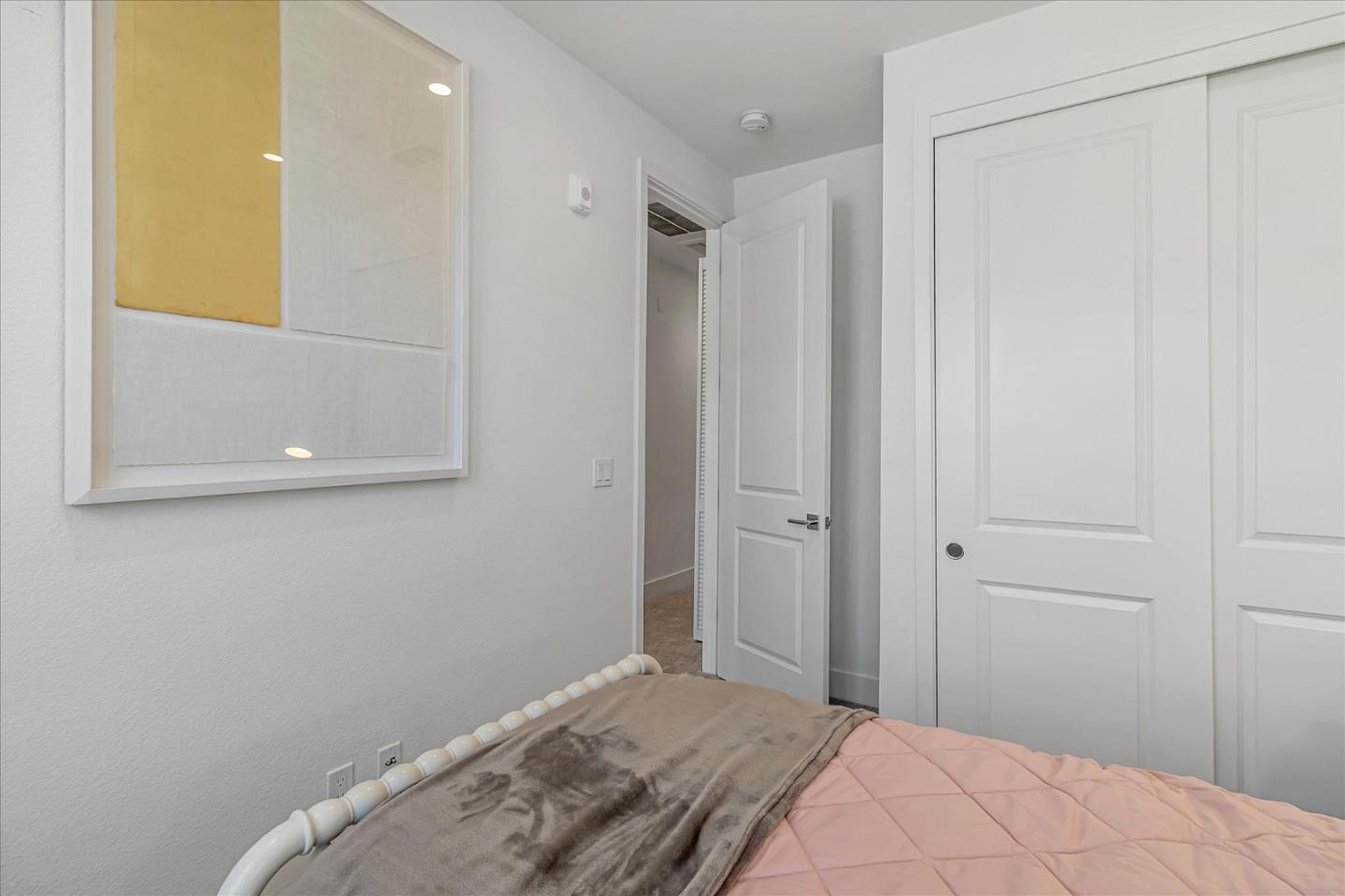 1277 Verano Road Mountain View, CA 94043 - Photo 35 of 52 a bedroom with a bed and a shower