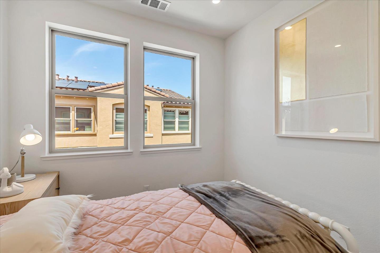 1277 Verano Road Mountain View, CA 94043 - Photo 36 of 52 a bedroom with a bed and a window