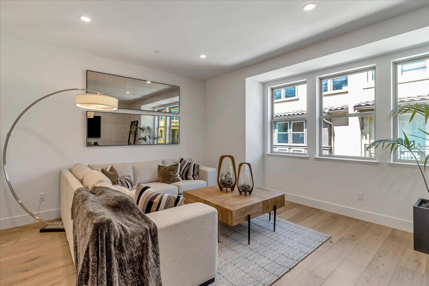 1277 Verano Road Mountain View, CA 94043 - Photo 6 of 52 a living room with furniture and a potted plant