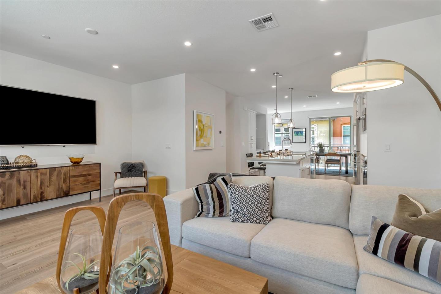 1277 Verano Road Mountain View, CA 94043 - Photo 8 of 52 a living room with furniture and a flat screen tv