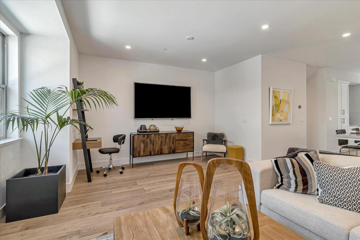1277 Verano Road Mountain View, CA 94043 - Photo 9 of 52 a living room with furniture and a flat screen tv