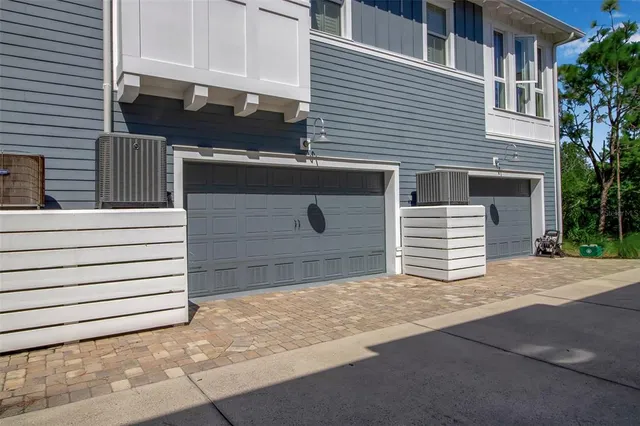 a kitchen with counter space dining table and chairs