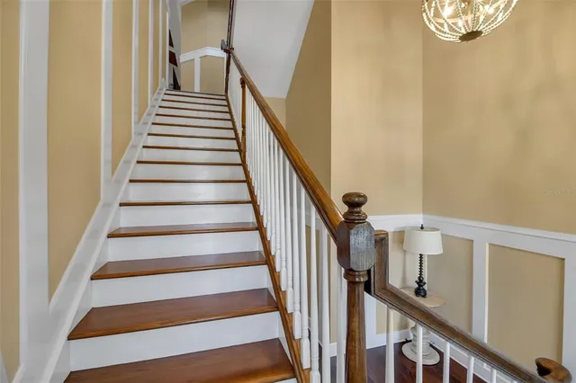 a kitchen with stainless steel appliances granite countertop a stove and a refrigerator