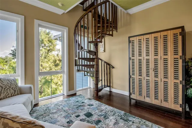 a bathroom with a tub a sink and mirror