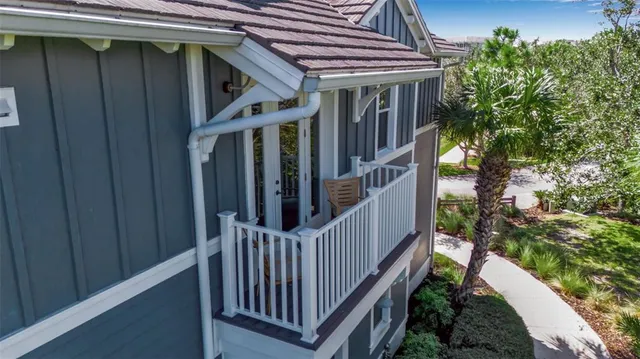 a view of a park with large trees