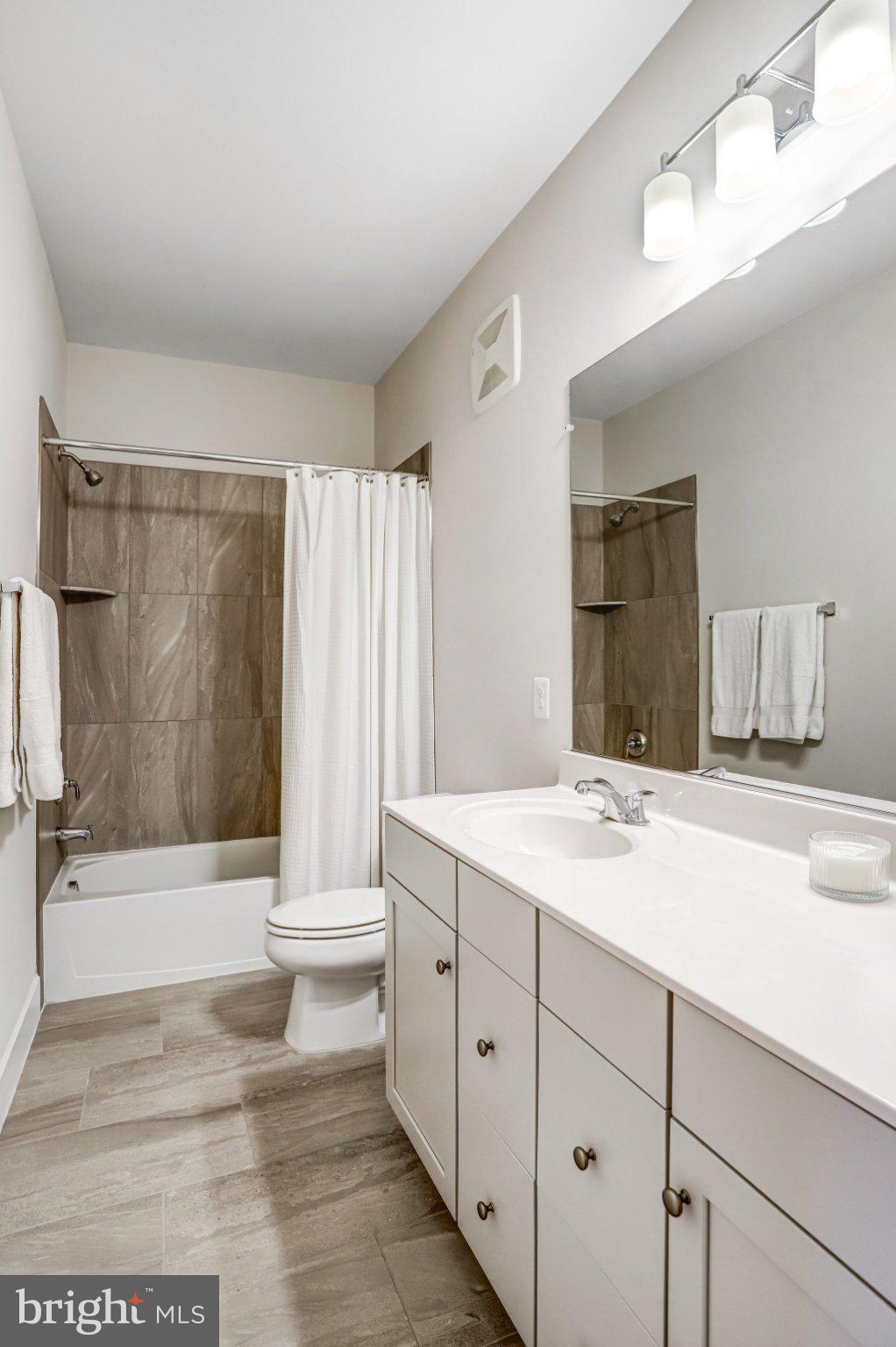 1662 Bandit Loop, Unit 3B Reston, VA 20190 - Photo 36 of 47 Bright Main Hall Bath