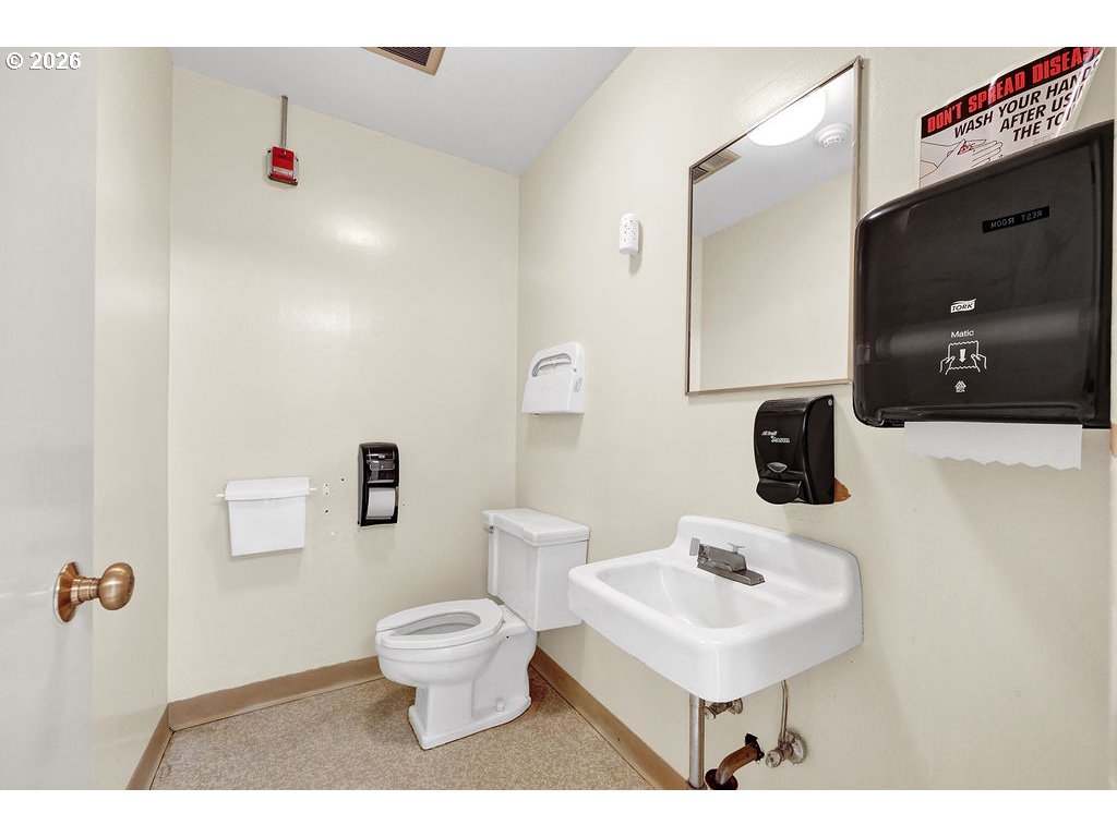 21211 Coburg Road Harrisburg, OR 97446 - Photo 23 of 48 a bathroom with a sink and a mirror