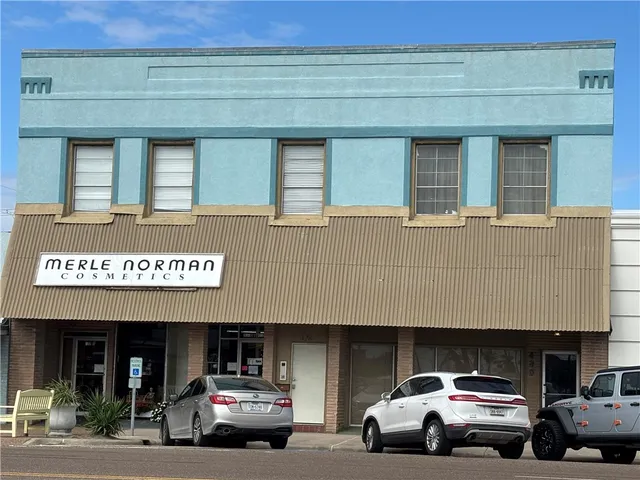a car parked in front of a building