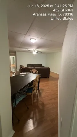 a room with a table and chairs