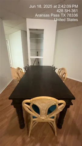 a blue bed sitting in a bedroom next to a window