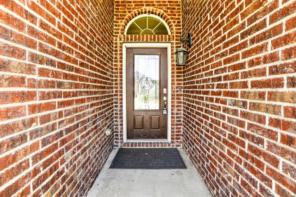 552 Winnetka Drive Oak Point, TX 75068 - Photo 3 of 40 a view of entrance door of a house