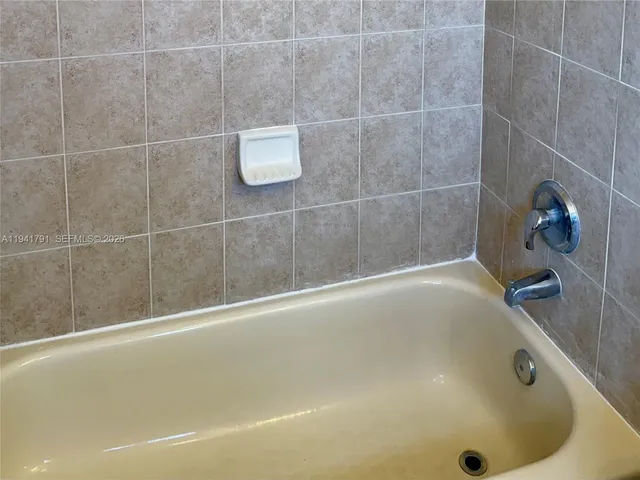 a bathroom with a tub