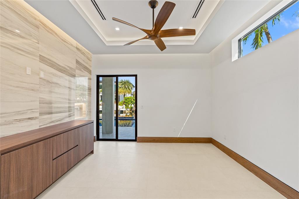 2441 Northeast 48th Court Lighthouse Point, FL 33064 - Photo 23 of 54 a view of an empty room with a window