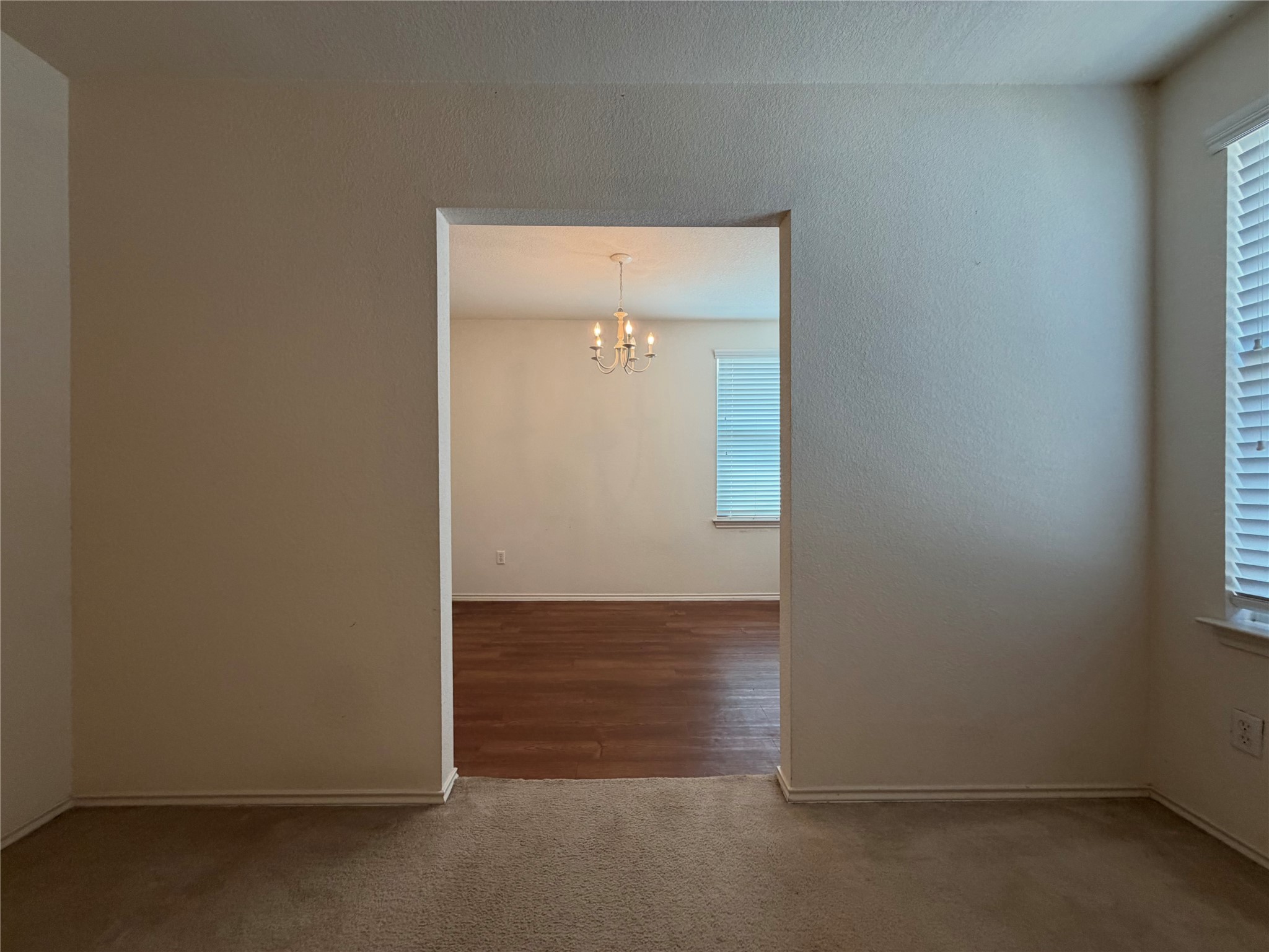 14504 Harris Ridge Boulevard, Unit B Pflugerville, TX 78660 - Photo 11 of 29 View of the flexible area / den connected to the primary suite.