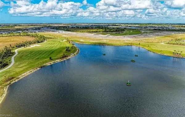 a view of sign board with street sign