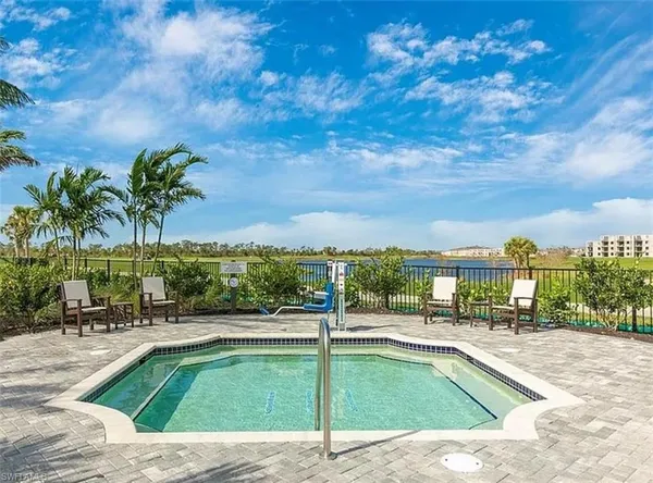 a view of a lake with a patio
