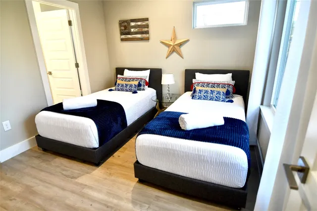 a bathroom with a shower and a mirror