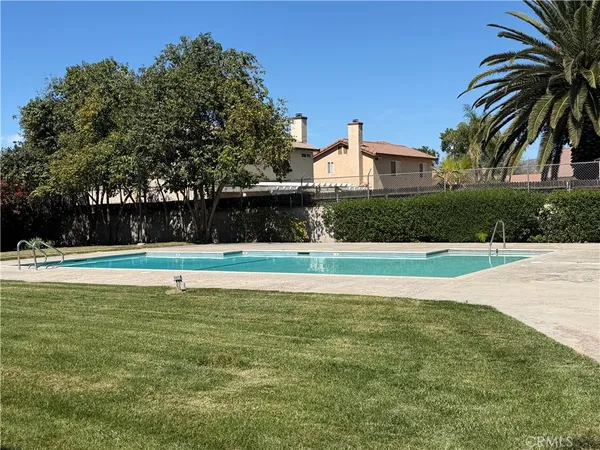 a view of a house with a swimming pool