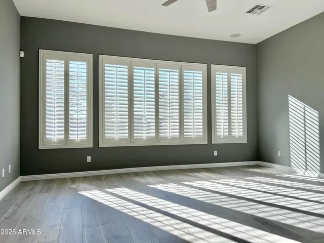 a view of a room with large windows