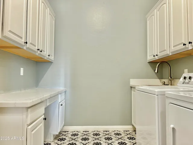 a bathroom with a sink toilet and vanity