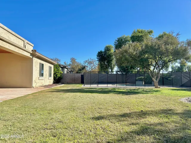 a view of a garden with a fountain