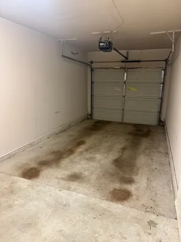 a view of a house with swimming pool and sitting area