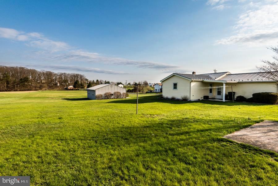357 Old Mill Road Carlisle, PA 17015 - Photo 3 of 20 Covered patio to rear